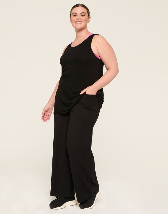 Photo of model in LIVI straight leg bottoms