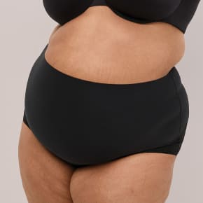 Model photo featuring Cacique high-waist panties