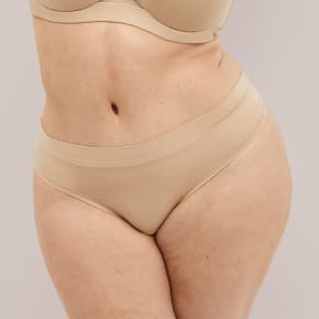Model photo featuring Cacique thong panties