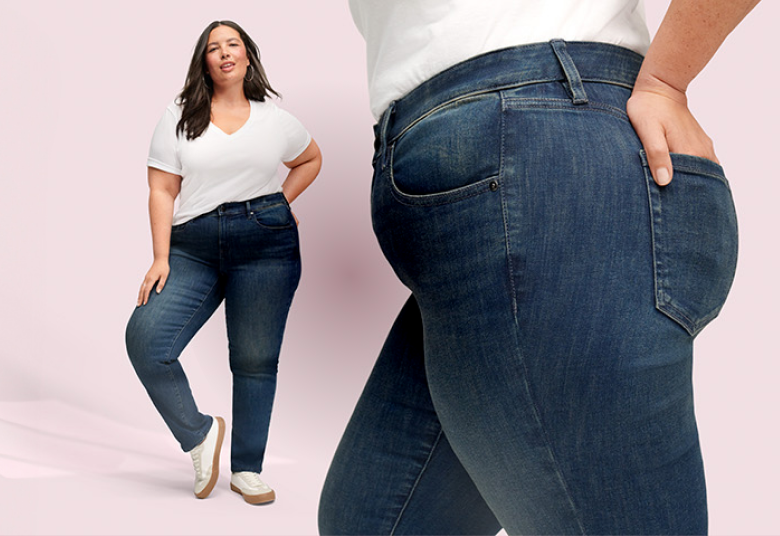 A woman in a white t-shirt and dark wash jeans stands on the left, while a close-up of denim jeans fills the right side of the frame against a soft pink background.