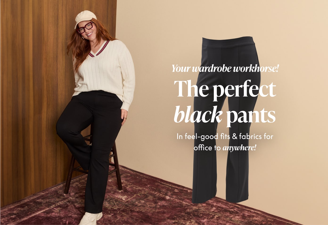 A woman in a cream sweater and black pants poses on a stool in the foreground, while a pair of black pants is displayed against a plain background.