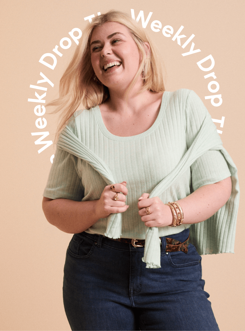 A smiling woman in a light green top and dark jeans is featured against a plain beige background with a circular text overlay.