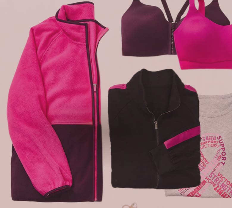 A pink and purple fleece jacket, a black fleece jacket, and two sports bras are arranged against a light pink background.