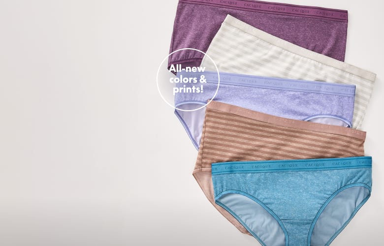 A stack of colorful women's underwear in various shades and patterns is arranged against a plain light gray background.