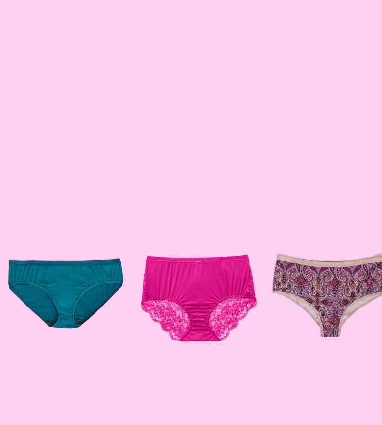 Three pairs of women's panties in teal, bright pink, and a patterned print are arranged horizontally against a solid pink background.