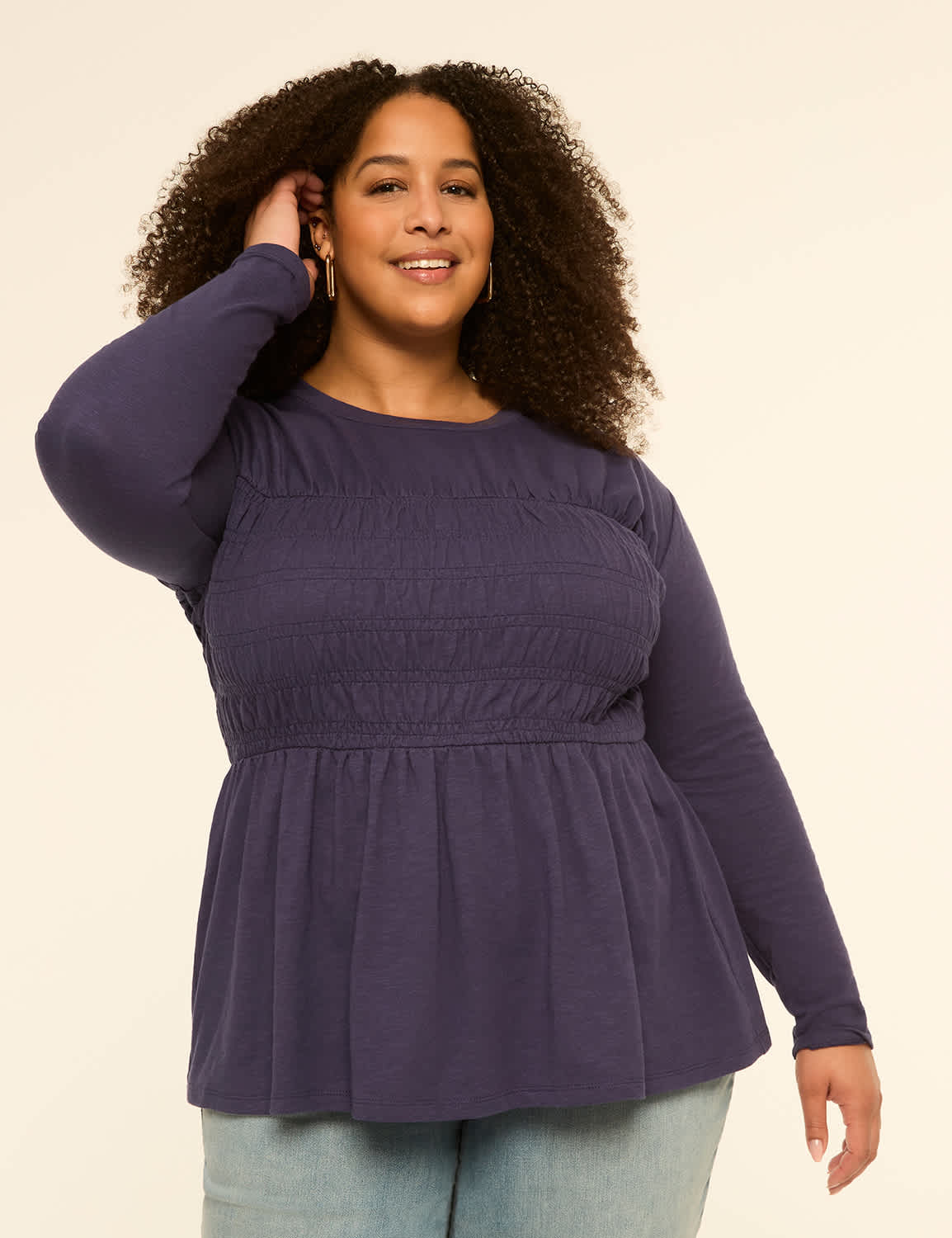 Fitted Long-Sleeve Smocked-Bodice Peplum Top