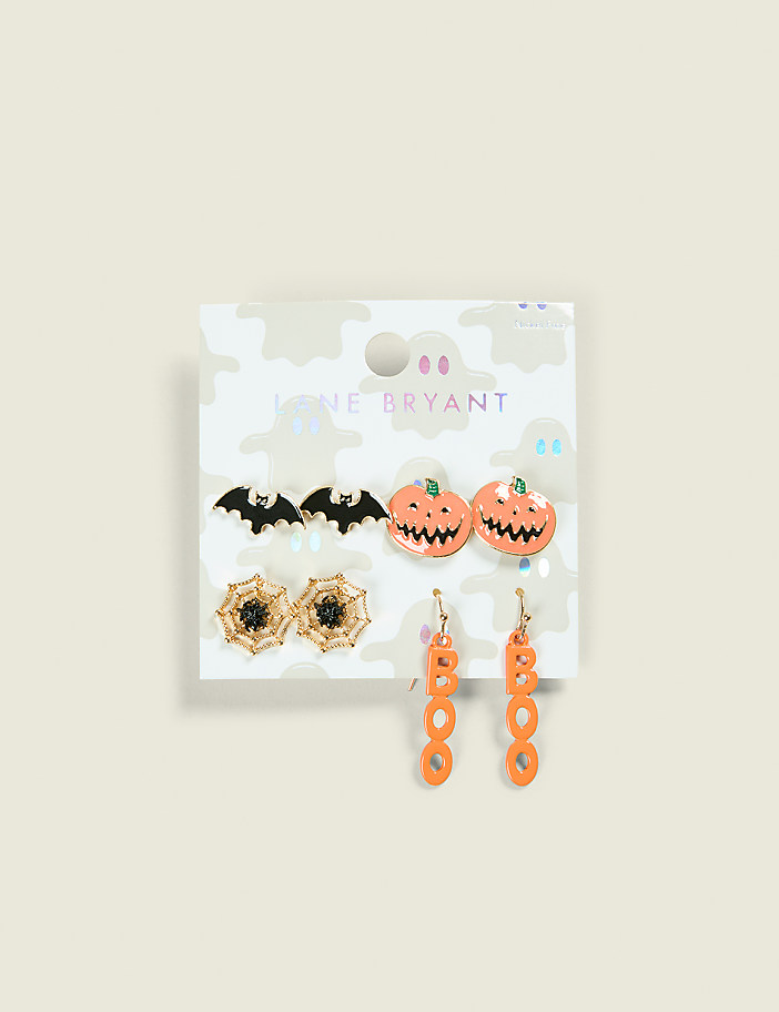 A set of Halloween-themed earrings, including bats, pumpkins, spiderwebs, and "BOO" designs, are displayed on a white card with a ghost pattern against a light gray background.