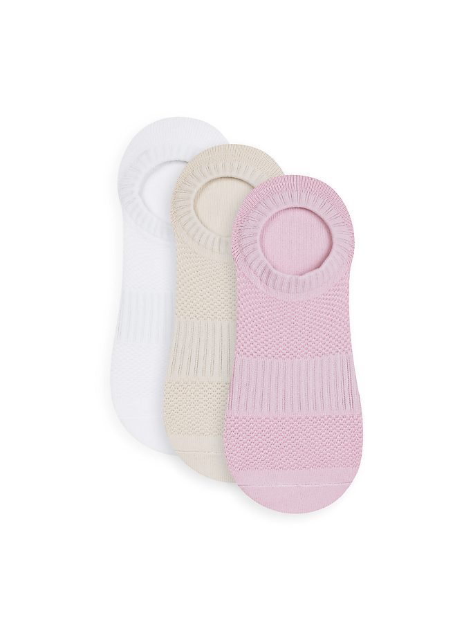 Three no-show socks in white, beige, and pink are arranged diagonally against a plain white background.