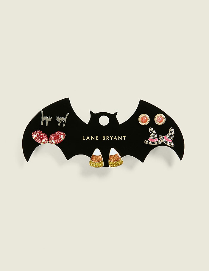 A black bat-shaped display card holds an assortment of Halloween-themed earrings, including cats, pumpkins, and candy corn, against a plain, light-colored background.