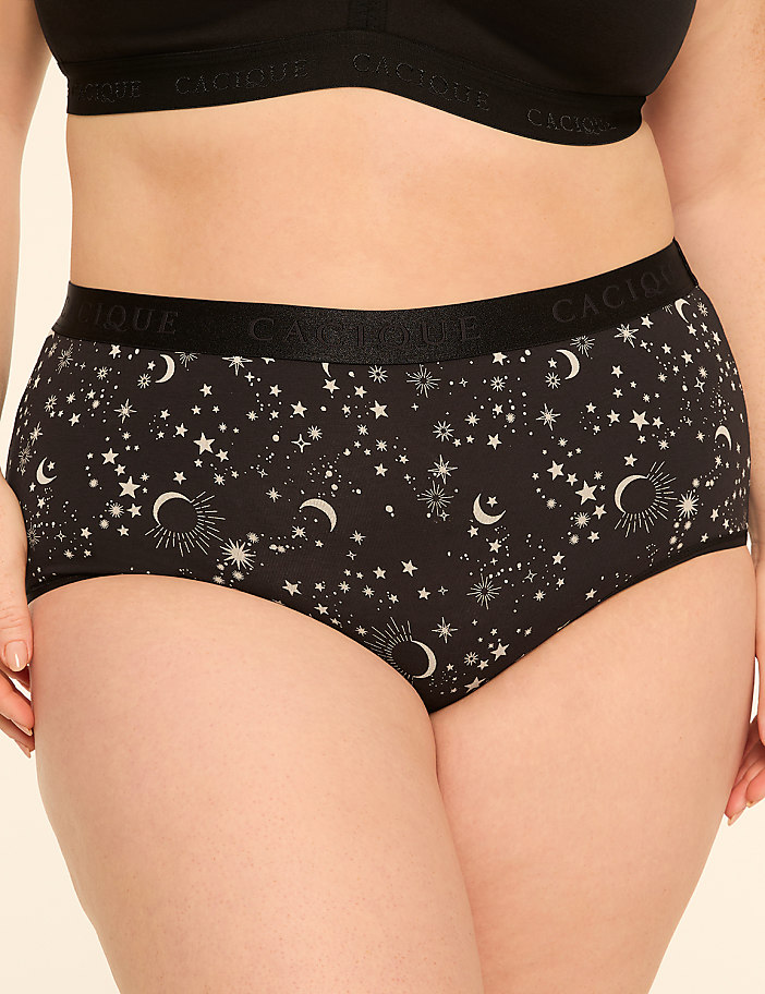 A pair of black high-waisted briefs with a celestial print are shown against a plain background.