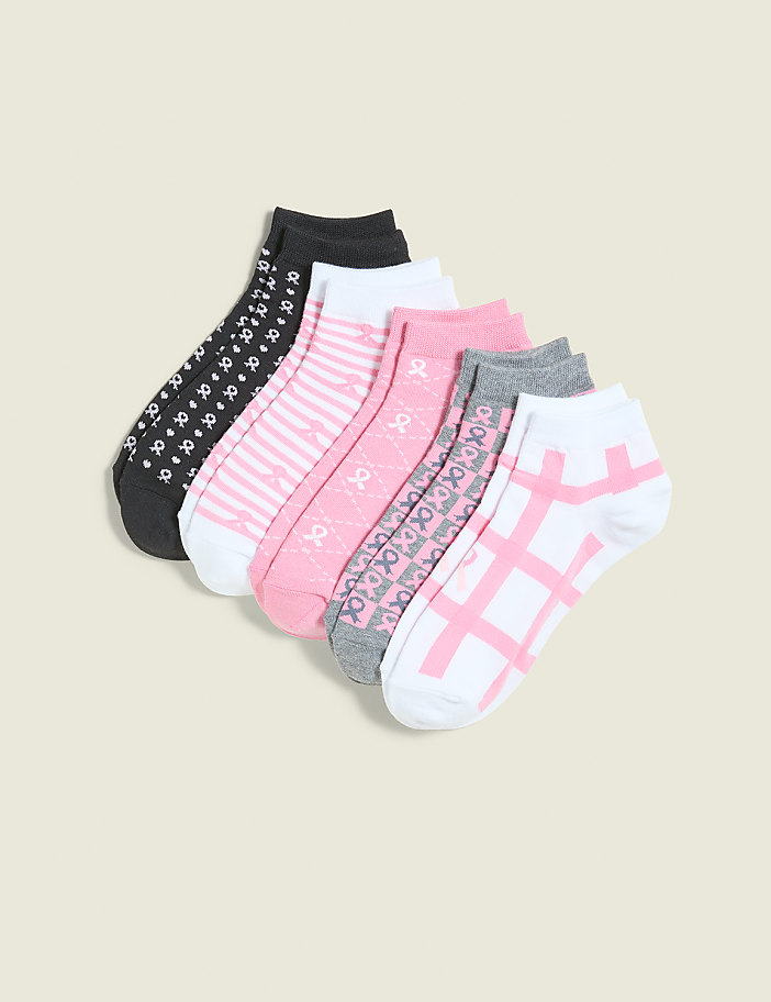 A collection of six ankle socks with various patterns, including stripes, checks, and ribbon designs, are arranged on a plain, light beige background.