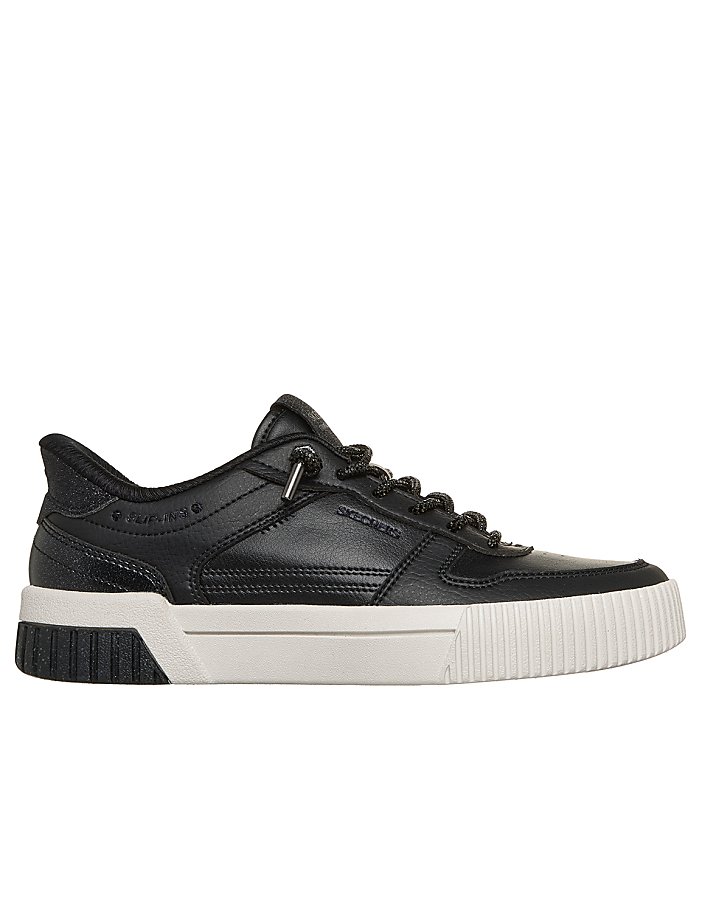 A black leather sneaker with a white sole sits against a plain white background.