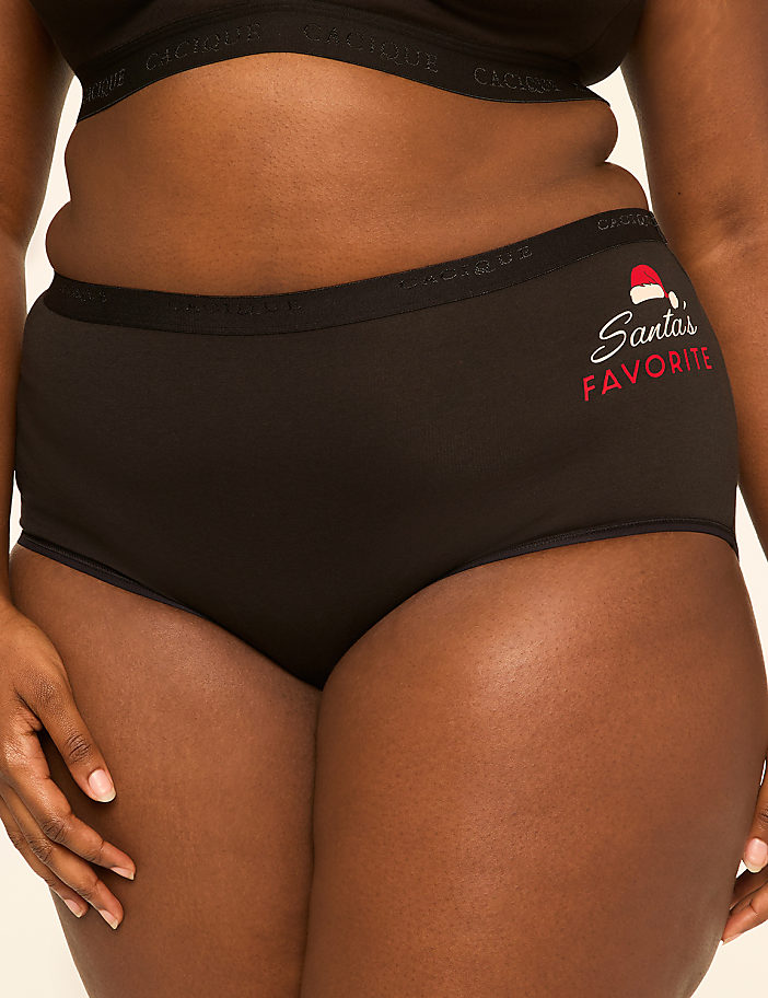 A person's lower body is shown wearing black underwear with "Santa's Favorite" embroidered on the right hip, against a plain, light-colored background.