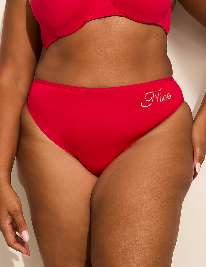A person's midsection is shown in the foreground, wearing red underwear with "Nice" written on it, against a plain, light-colored background.