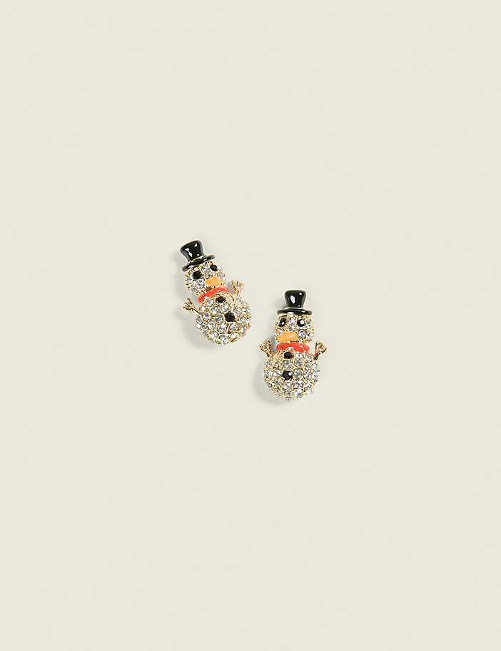 Two sparkling snowman earrings with black top hats and orange noses are centered on a plain, light beige background.