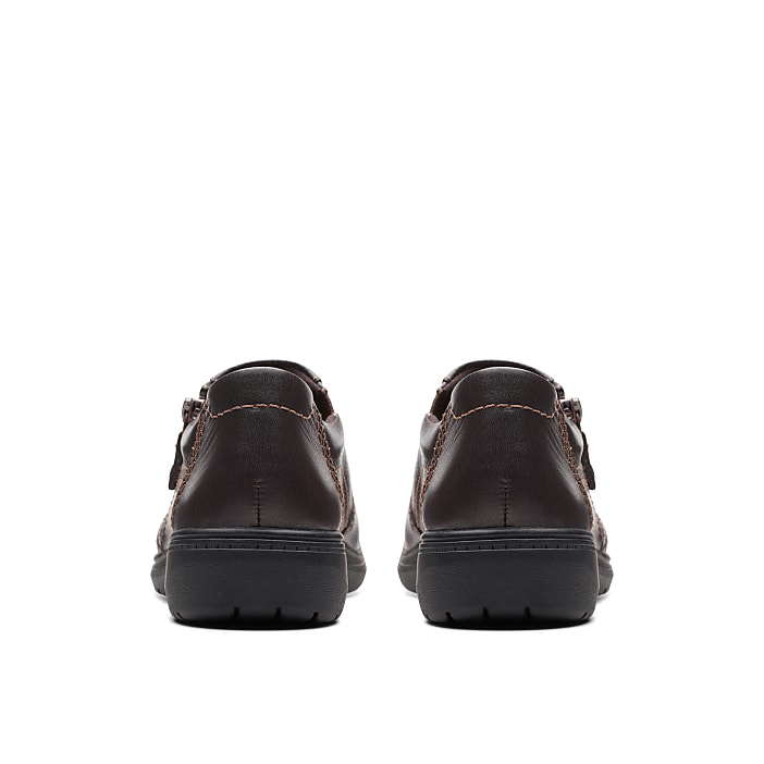 A pair of brown leather shoes are positioned side-by-side against a plain white background.
