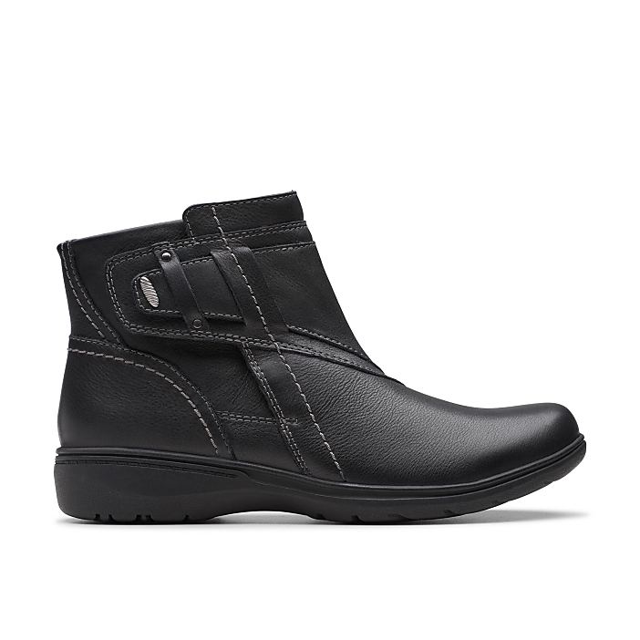 A black leather ankle boot with strap details sits centered against a plain white background.