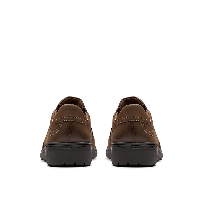A pair of brown leather shoes are positioned side-by-side against a plain white background.
