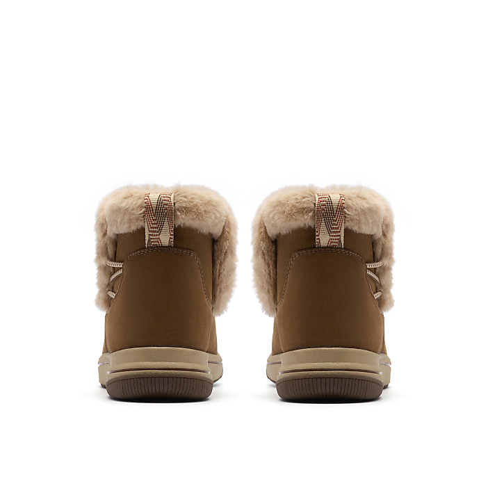 A pair of brown faux-fur lined boots are positioned centrally against a plain white background.