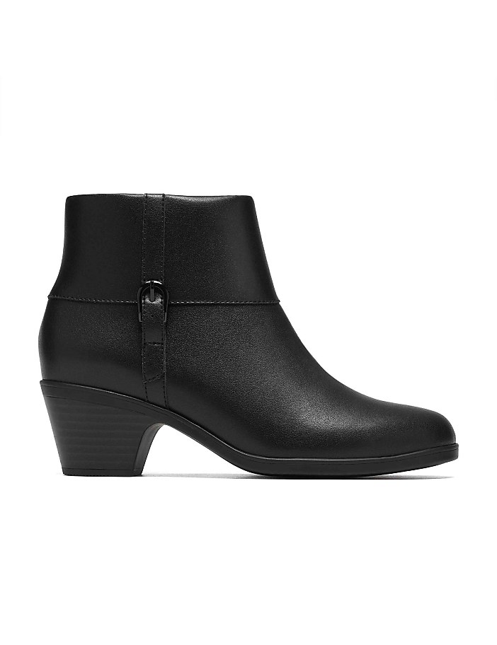 A single black leather ankle boot stands centered against a plain white background.