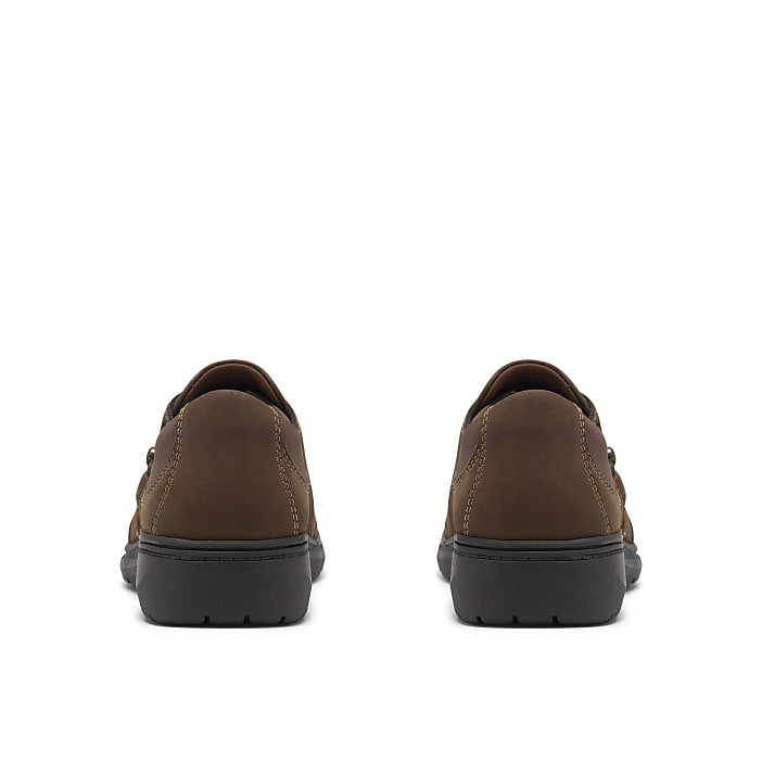 A pair of brown leather shoes are positioned side-by-side against a plain white background.