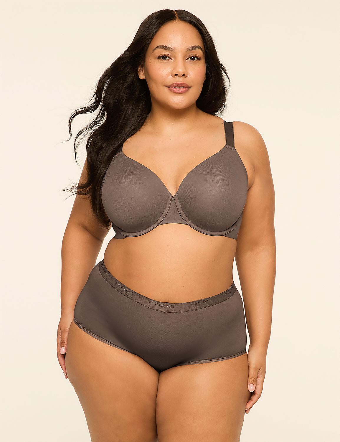 A woman with dark hair and a fuller figure poses in a grey bra and matching underwear against a plain, light-colored background. Product Image 4