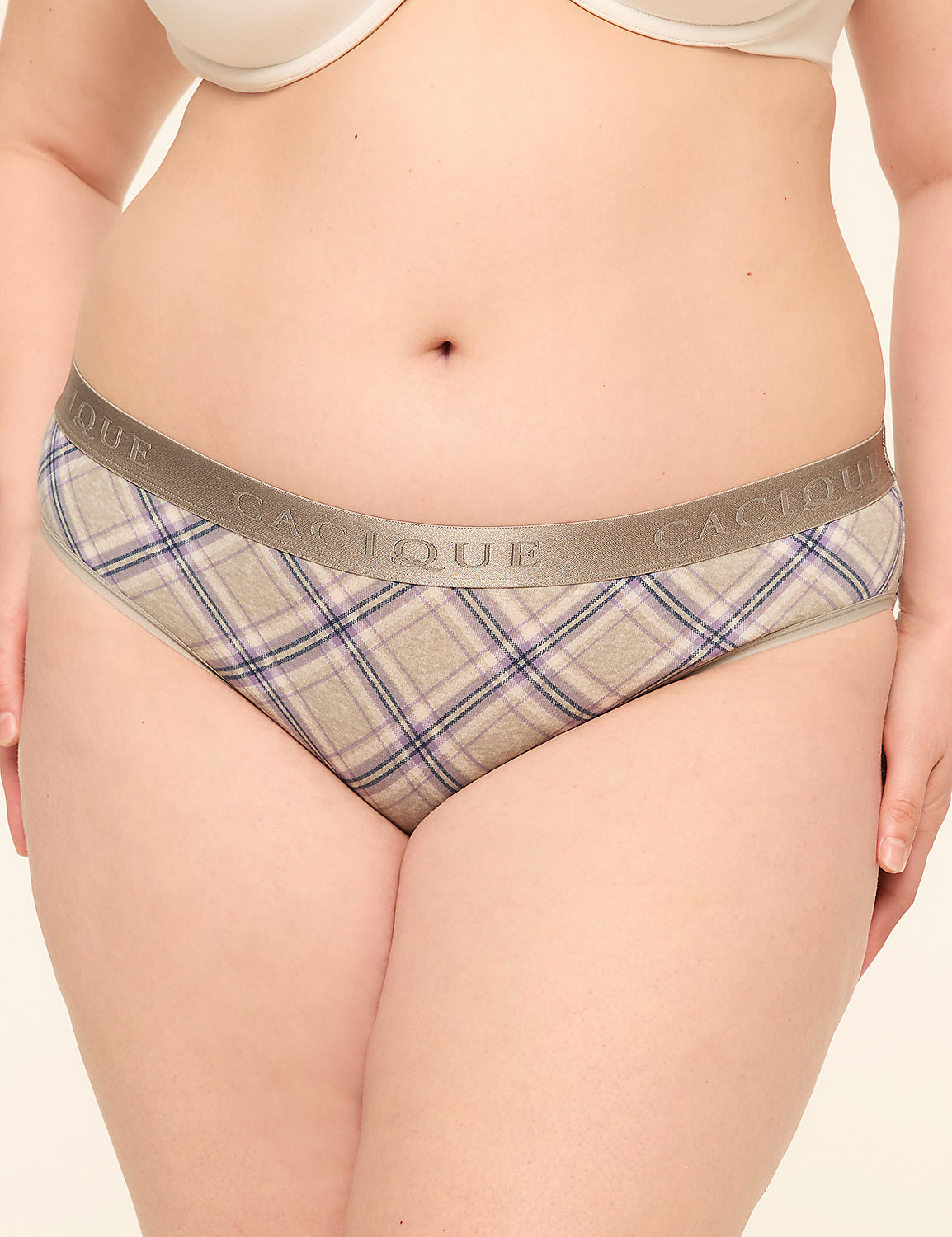 A person's torso is shown from the waist down, wearing plaid underwear and a white bra, against a plain background. Product Image 1