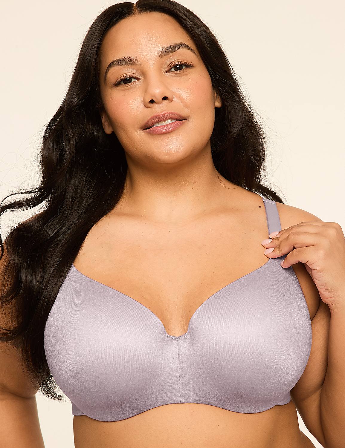 A woman with dark hair and a light complexion wears a light purple bra, with a plain, light-colored background. Product Image 1