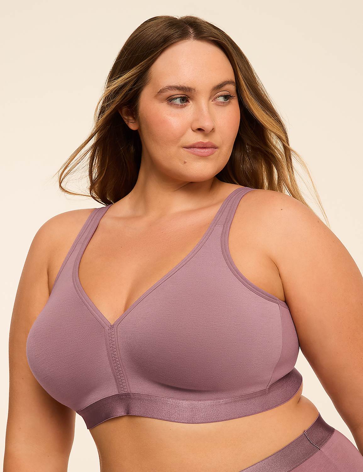 A woman in a mauve bra is pictured against a plain, light-colored background. Product Image 1