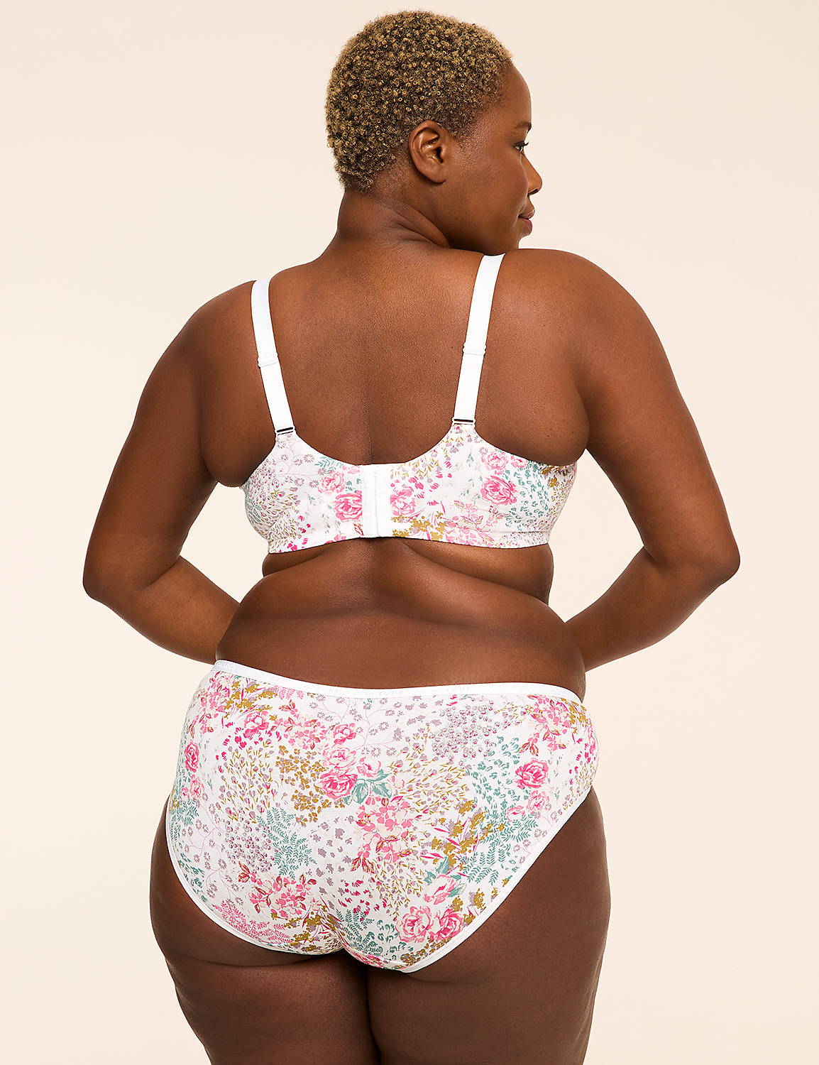 A woman with short blonde hair is shown from the back, wearing a floral bra and matching underwear against a plain, light-colored background. Product Image 2