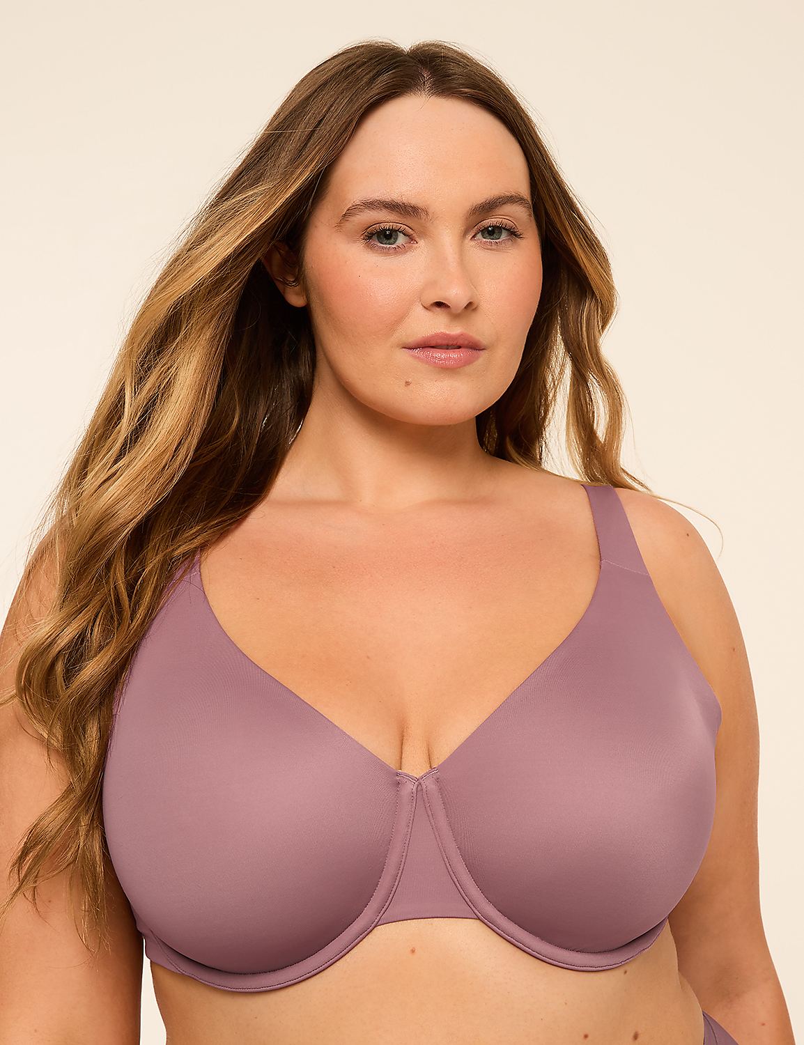 A woman with long blonde hair wears a mauve bra against a plain beige background. Product Image 1