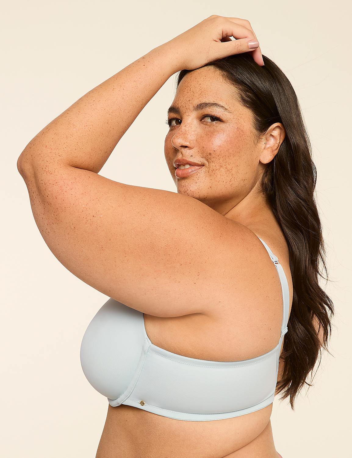 A woman with freckles poses in a light blue bra against a plain, light-colored background. Product Image 2