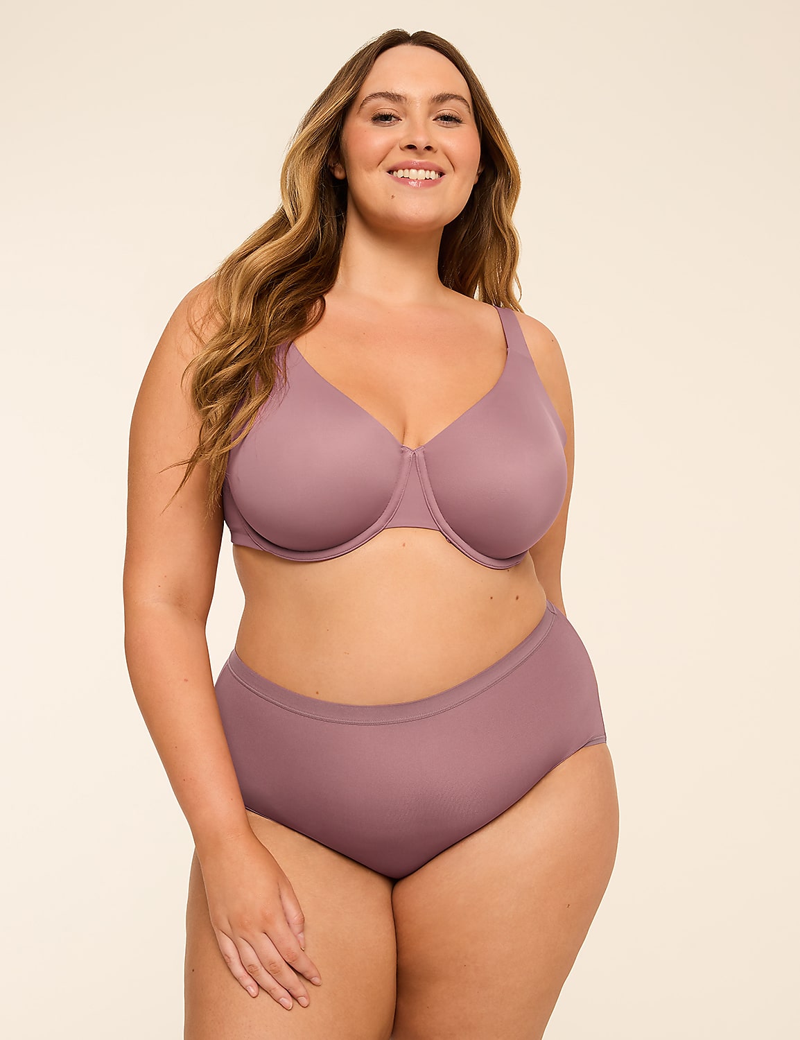 A smiling woman in a mauve bra and matching high-waisted briefs stands against a plain, light-colored background. Product Image 3