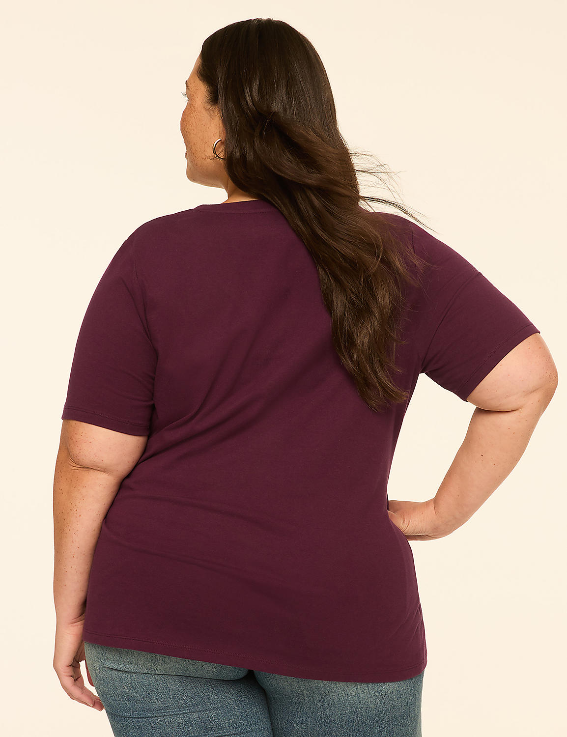 A woman in a maroon t-shirt and jeans stands with her back to the viewer against a plain, light-colored background. Product Image 2