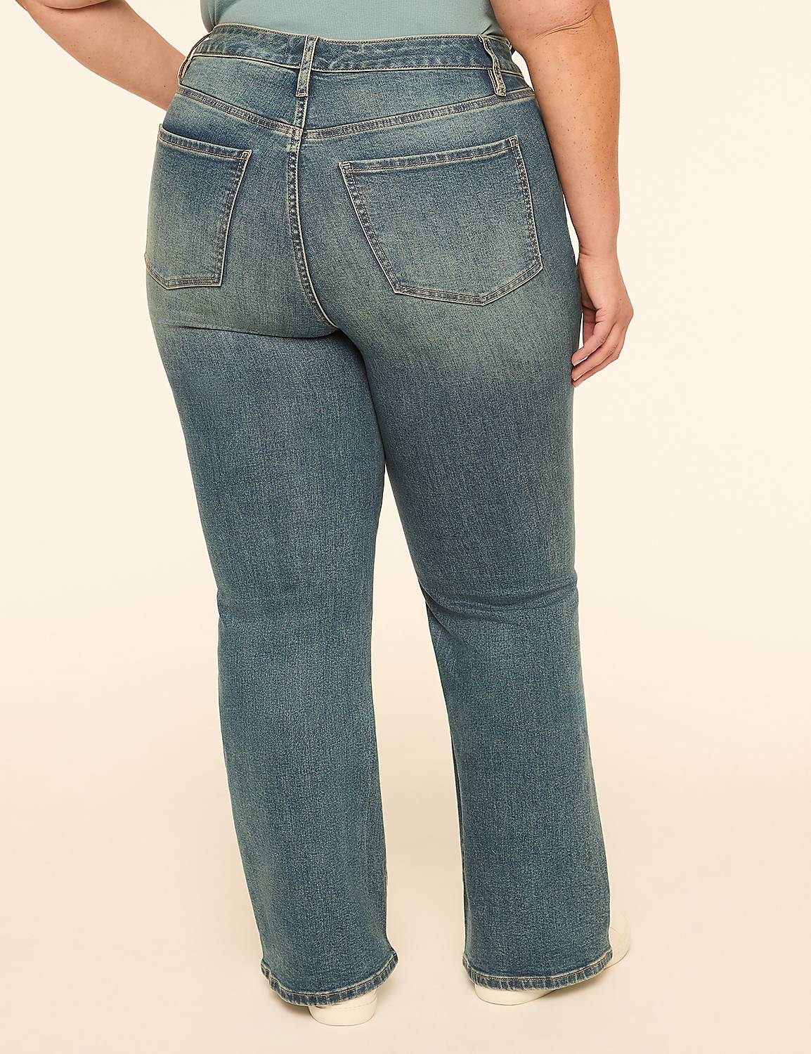 A person wearing blue jeans stands against a plain, light-colored background. Product Image 2