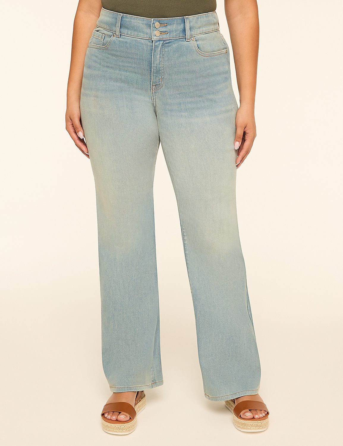 A person wearing light-wash jeans and brown platform sandals stands against a plain, light-colored background. Product Image 1
