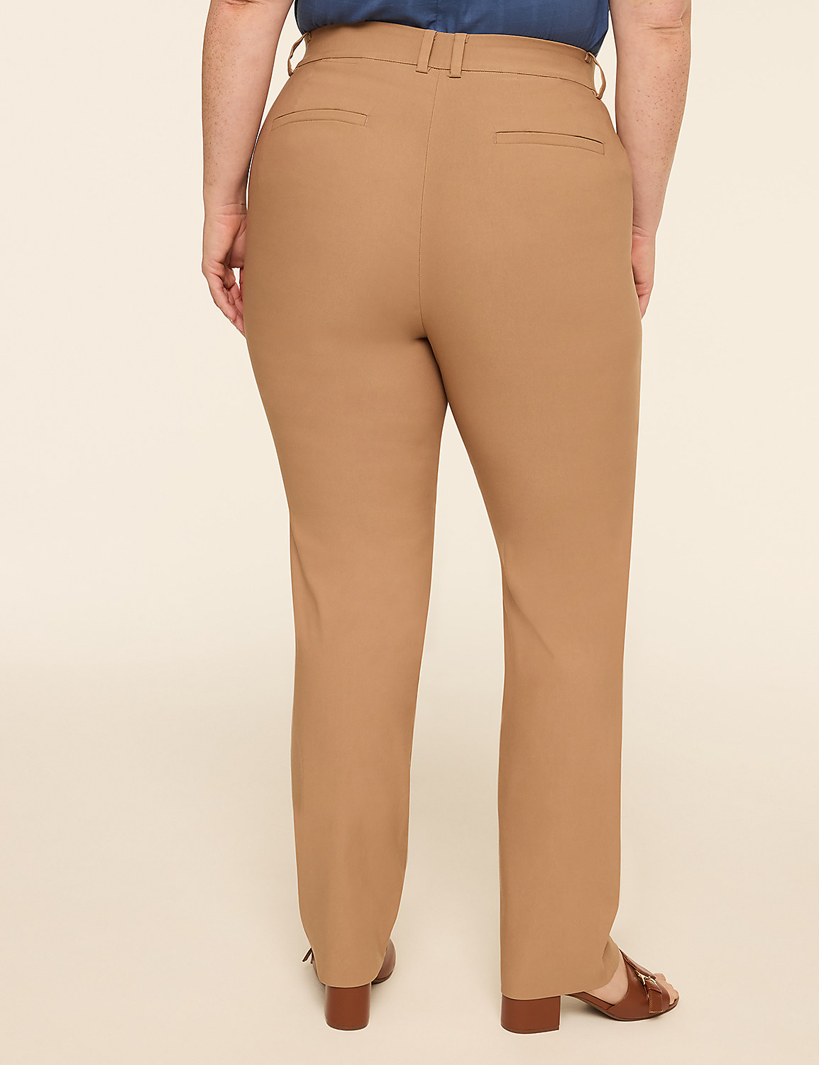 A person wearing tan pants stands against a plain, light-colored background. Product Image 2