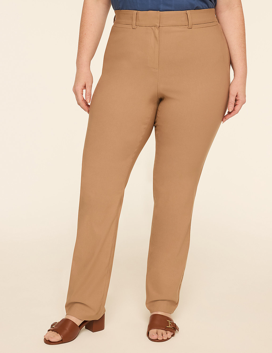 A person stands in tan dress pants and brown sandals against a plain, light-colored background. Product Image 1