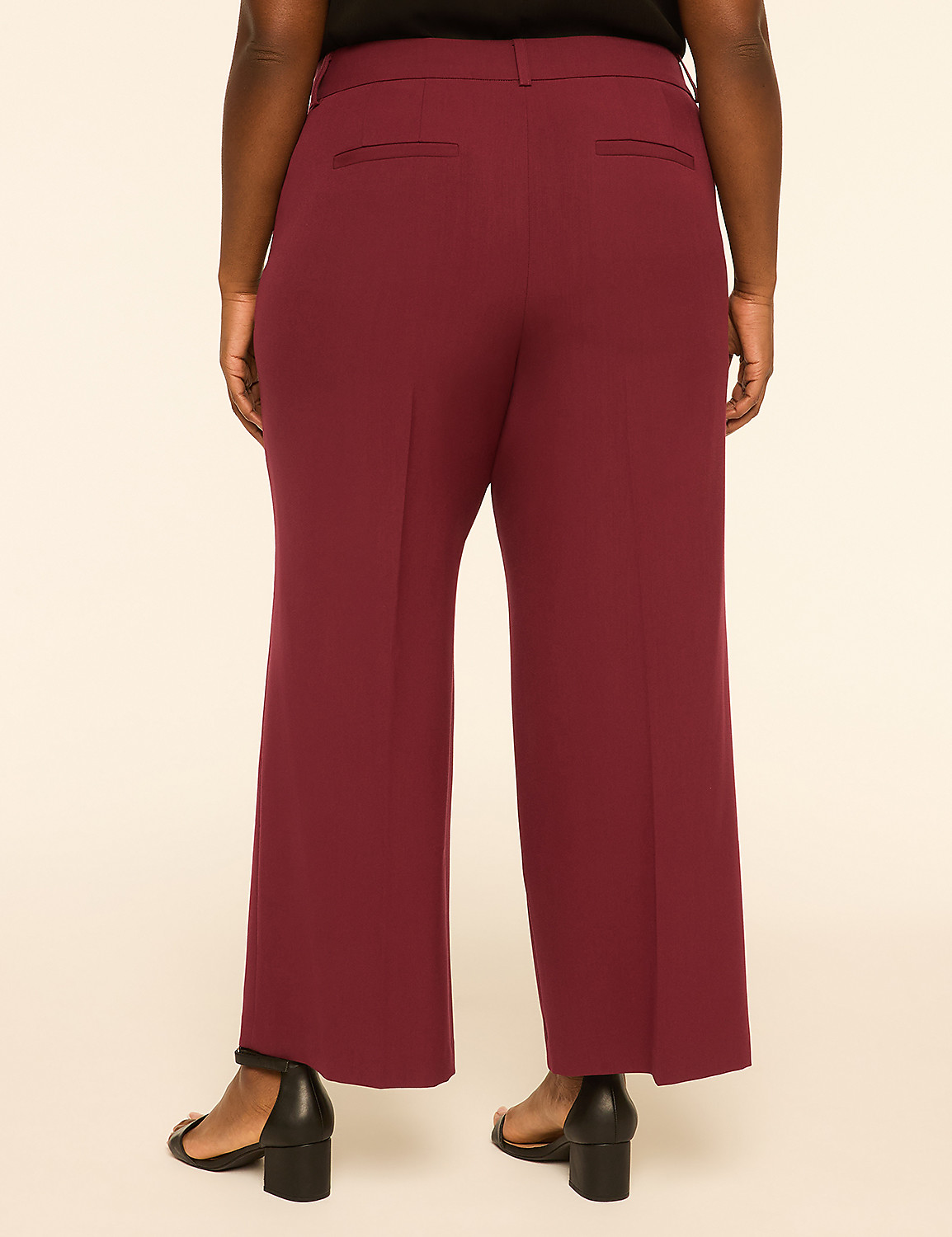 A person wearing burgundy wide-leg pants and black heels stands against a plain, light-colored background. Product Image 2