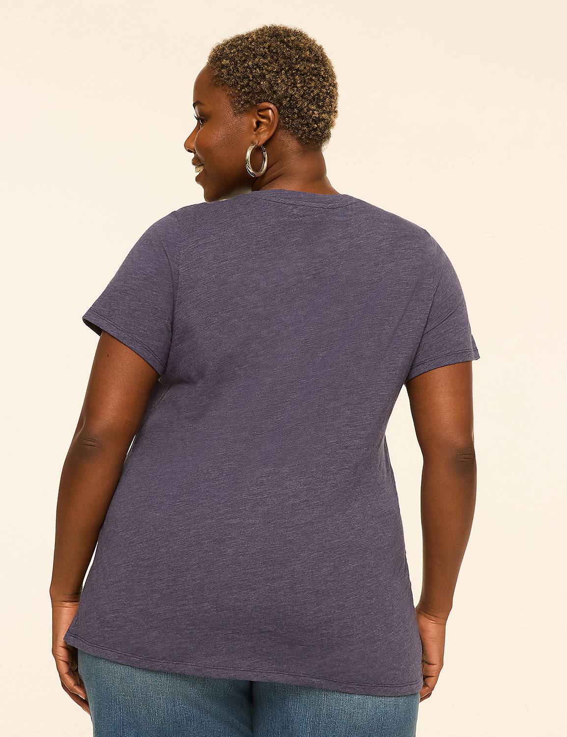 A woman in a blue t-shirt and jeans stands against a plain, light-colored background. Product Image 2