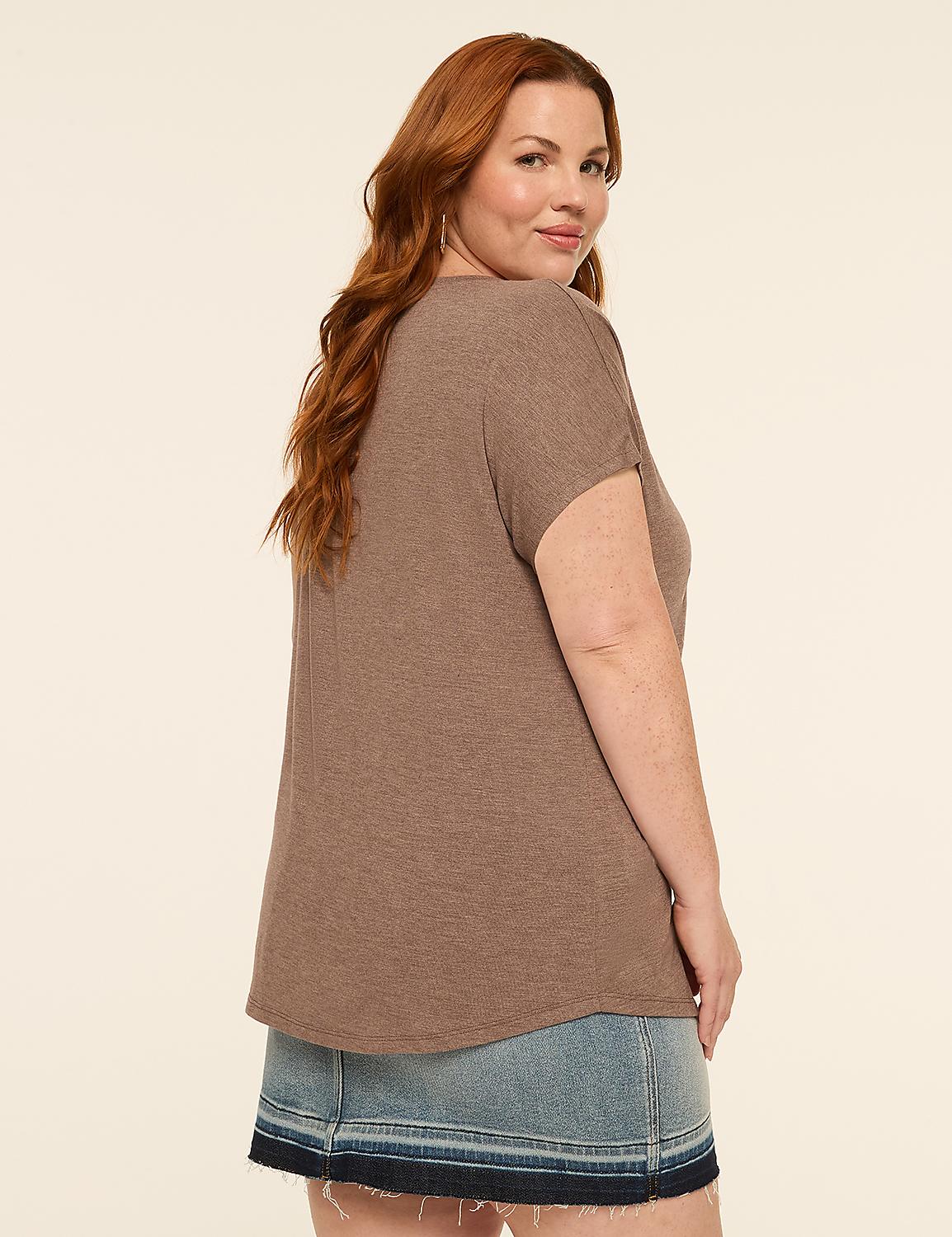 A woman with auburn hair wearing a brown t-shirt and denim skirt poses against a plain, light-colored background. Product Image 2