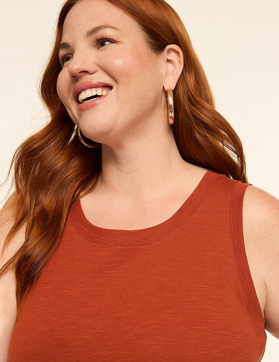 A smiling woman with red hair and hoop earrings in the foreground is set against a plain, light-colored background. Product Image 3