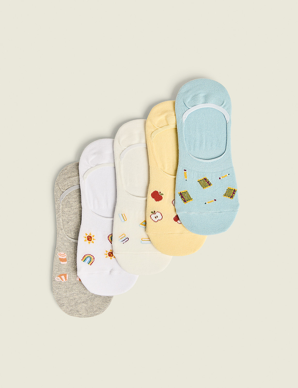 Five no-show socks with playful patterns are arranged diagonally against a plain, light-colored background. Product Image 1