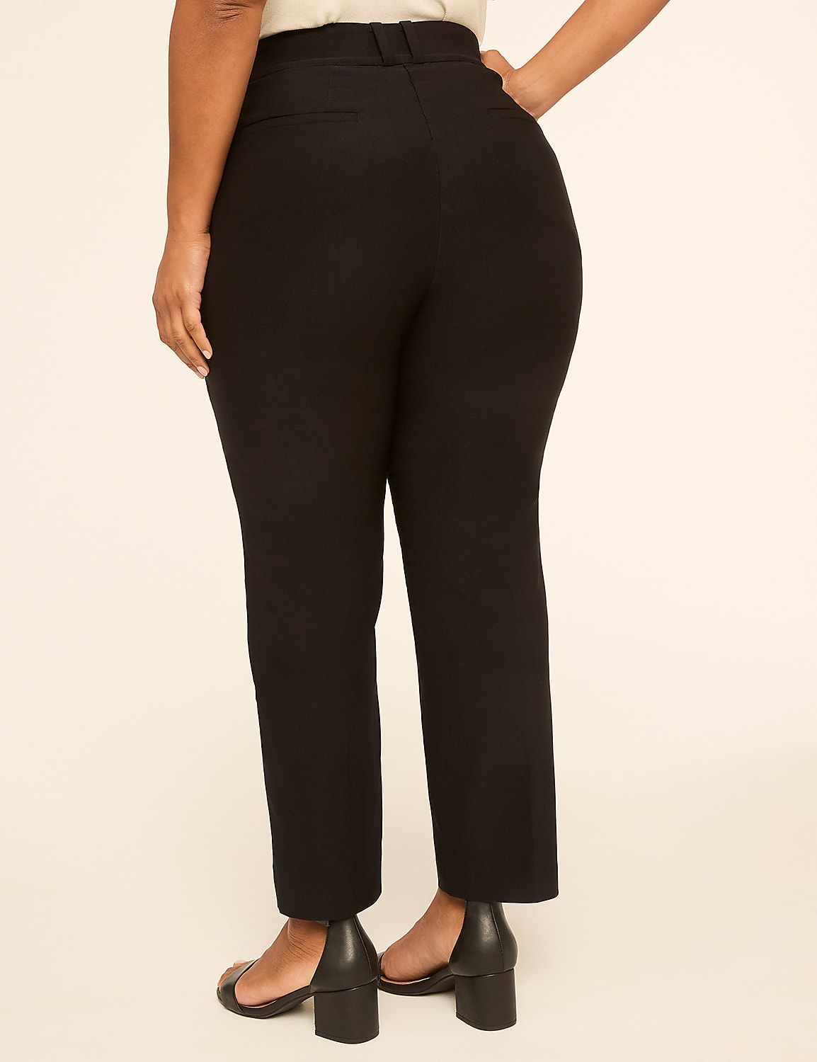 A person wearing black pants and black heels stands against a plain, light-colored background. Product Image 2