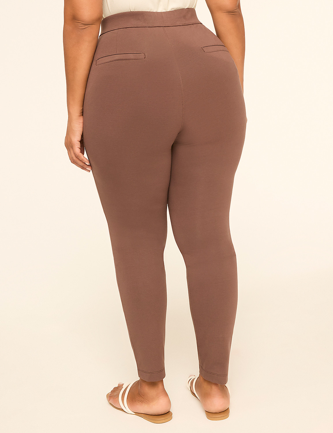 A person wearing brown pants and white sandals stands against a plain, light-colored background. Product Image 2