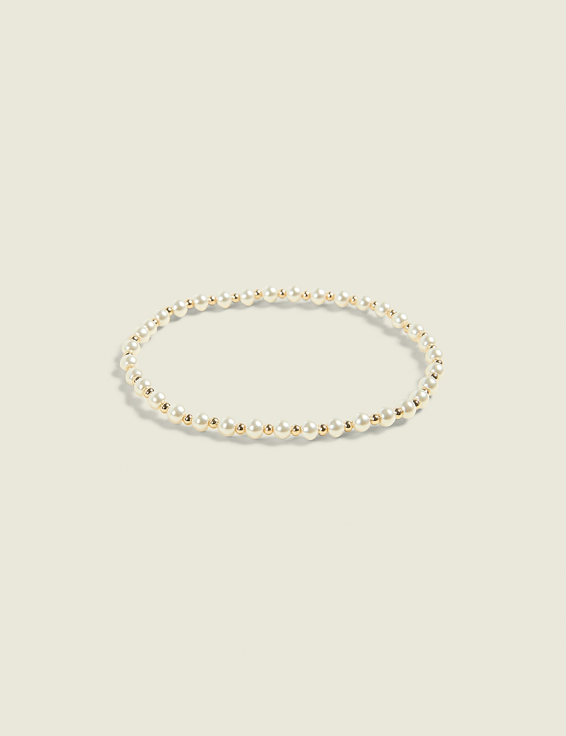 Goldtone & Pearlized Stretch Bracelet Product Image 1