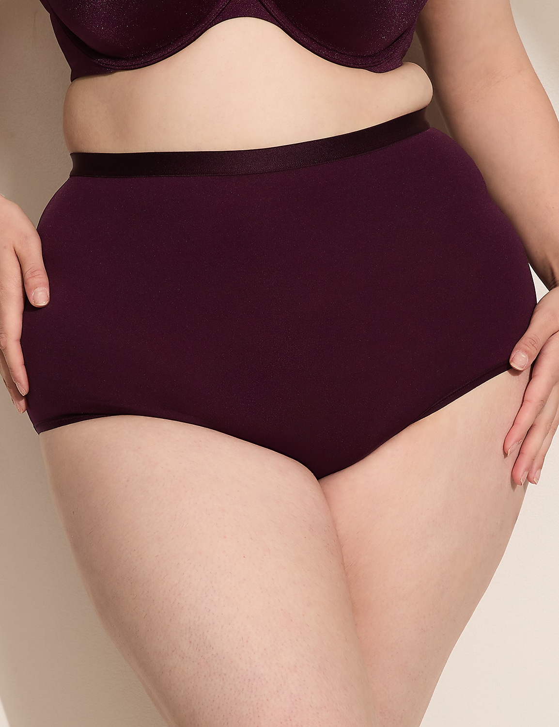 A person in burgundy underwear stands against a plain background. Product Image 1