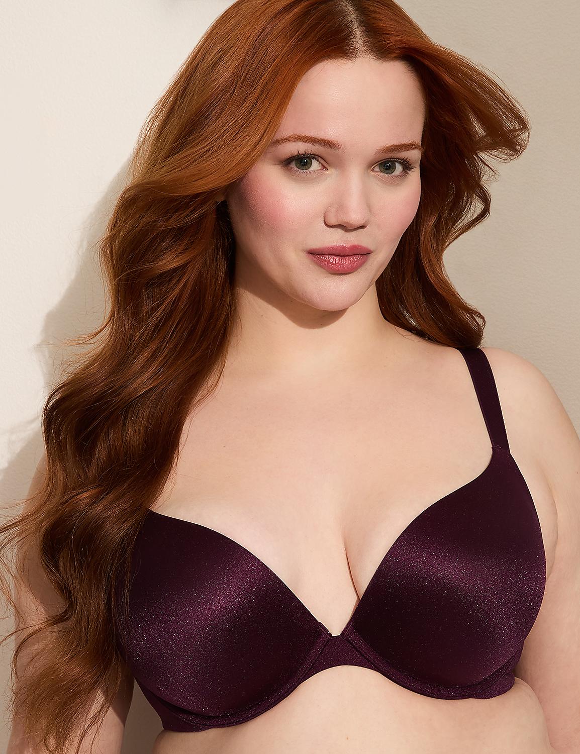 A woman with long, wavy auburn hair and fair skin, wearing a deep purple bra, is shown against a plain, light-colored background. Product Image 1