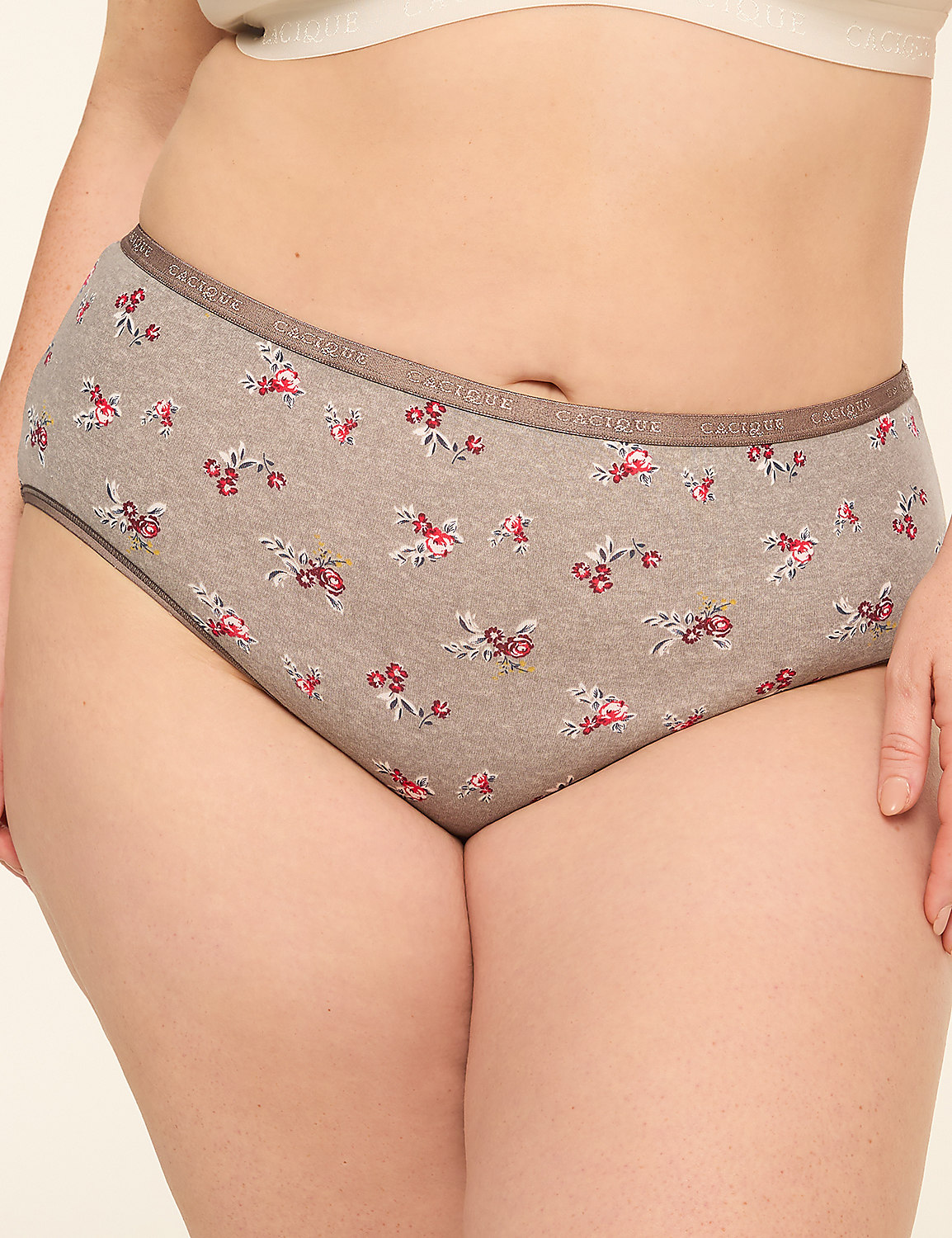 A close-up of a person wearing floral-patterned underwear against a plain, light-colored background. Product Image 1