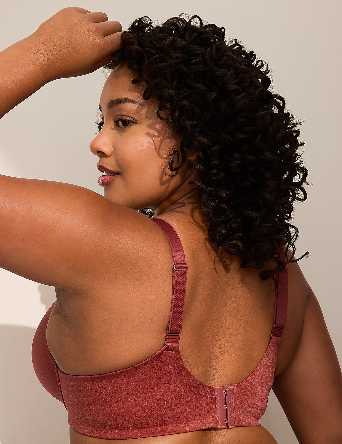 A woman with curly dark hair is shown from the back, wearing a rose-colored bra against a plain, light-colored background. Product Image 3